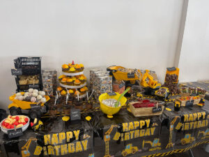 thrive gymnastics aurora birthday party construction theme dessert table