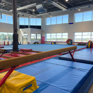 thrive gymnastics aurora gym floor balance beam training