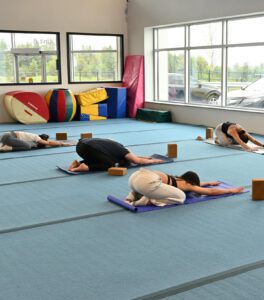 thrive gymnastics aurora ontario adult yoga class childs pose 1