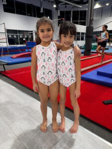 thrive gymnastics aurora ontario christmas penguin leotards young gymnasts 1