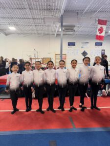 thrive gymnastics aurora ontario competitive team at meet group photo