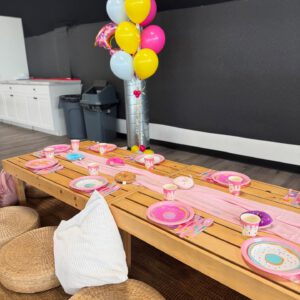 thrive gymnastics aurora ontario donut theme birthday party room dark