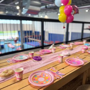 thrive gymnastics aurora ontario donut theme party table close view